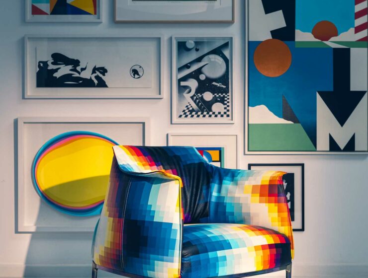 armchair on the background of paintings